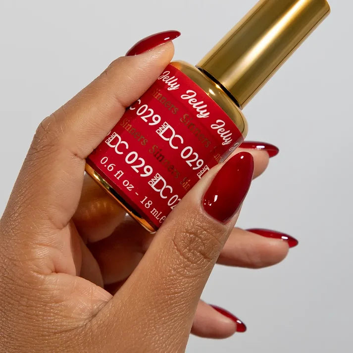 DND DC jelly gel polish deep skin manicure for Sinner 029 with a deep red orange undertone glow