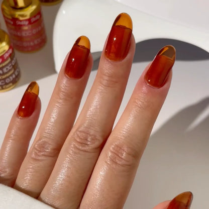 DND DC jelly gel polish fair skin manicure for Caramel 034 with a warm burnt honey glow