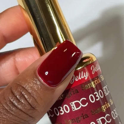 DND DC jelly gel polish manicure application for Sangria 030 showing the wine red finish