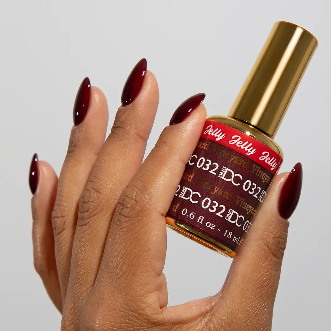 DND DC jelly gel polish manicure application for Vineyard 032 showing wine red finish