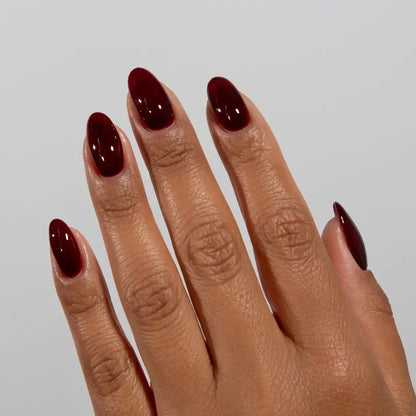 DND DC jelly gel polish nail polish 031 Cabernet bottle showing the jelly gel polish formula in a wine red shade