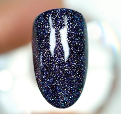 DND DC Midnight #253 dark navy black manicure with rainbow holographic glitter finish