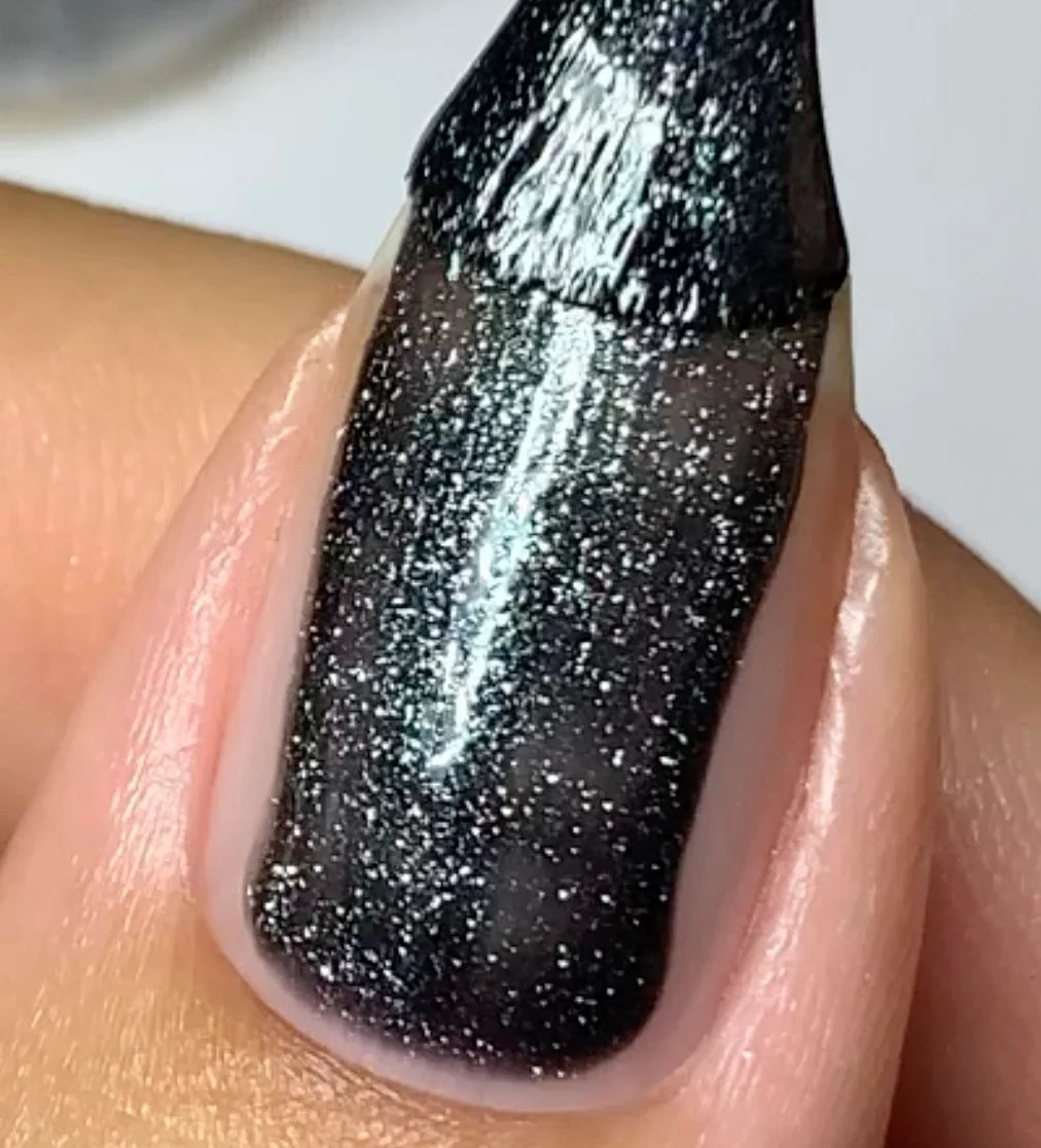 Metallic black nails created with DND DC Seaweed #252 gel nail polish