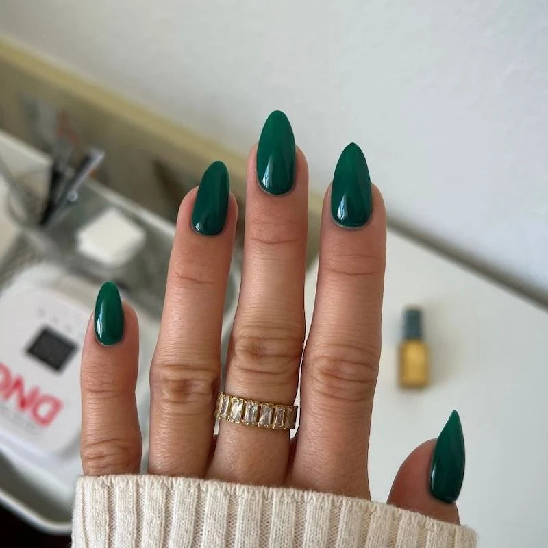 Deep forest green gel nails manicure using DND DIVA 244 Emerald Meadow polish