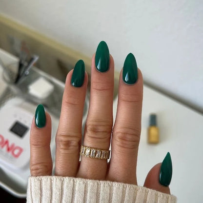 Deep forest green gel nails manicure using DND DIVA 244 Emerald Meadow polish