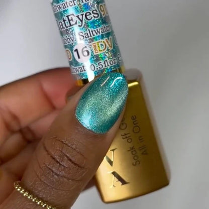 Close up manicure photo in DND Diva Cat Eye Gel Polish #16 Saltwater Tabby, showing the depth of the aquamarine cat eye effect.