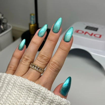 Full manicure in DND Diva Cat Eye Gel Polish #16 Saltwater Tabby, showing the aquamarine cat eye finish on natural nails.
