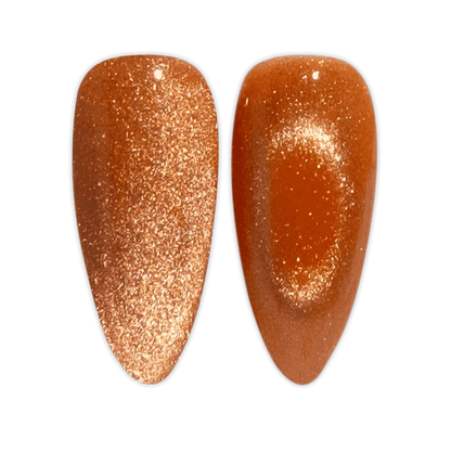 Close up swatch of DND Diva Cat Eye Gel Polish #21 Button Nose showing the caramel orange cat eye nail polish effect.