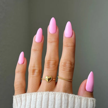Bright neutral pink gel manicure painted with DND DIVA Pink Ribbons on natural nails