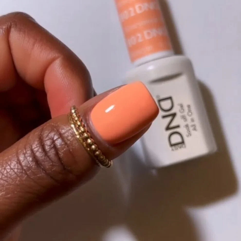 DND Honeymoon #802 light beige and orange manicure