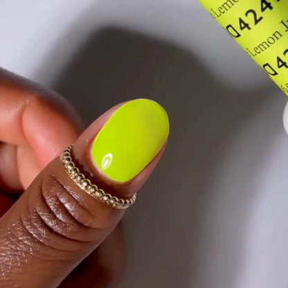 Yellow nails featuring DND Lemon Juice #424 gel polish