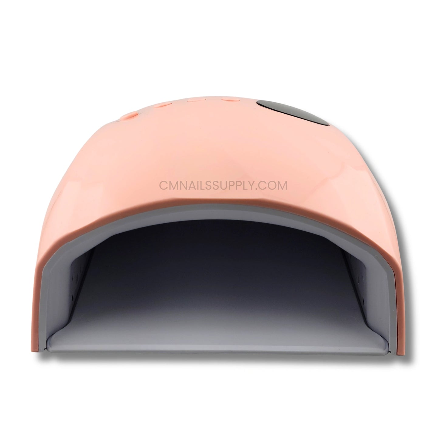 DND nail lamp shown with its retail packaging box