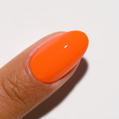 Close-up of DND Orange Sherbet #713 orange gel polish manicure