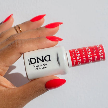 Finger nail painted with DND Red #563, a bold neon red gel polish