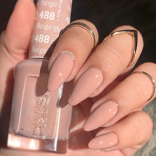 Light brown nude manicure featuring DND Season Beige #488 with the matching Gel & Lacquer Duo.