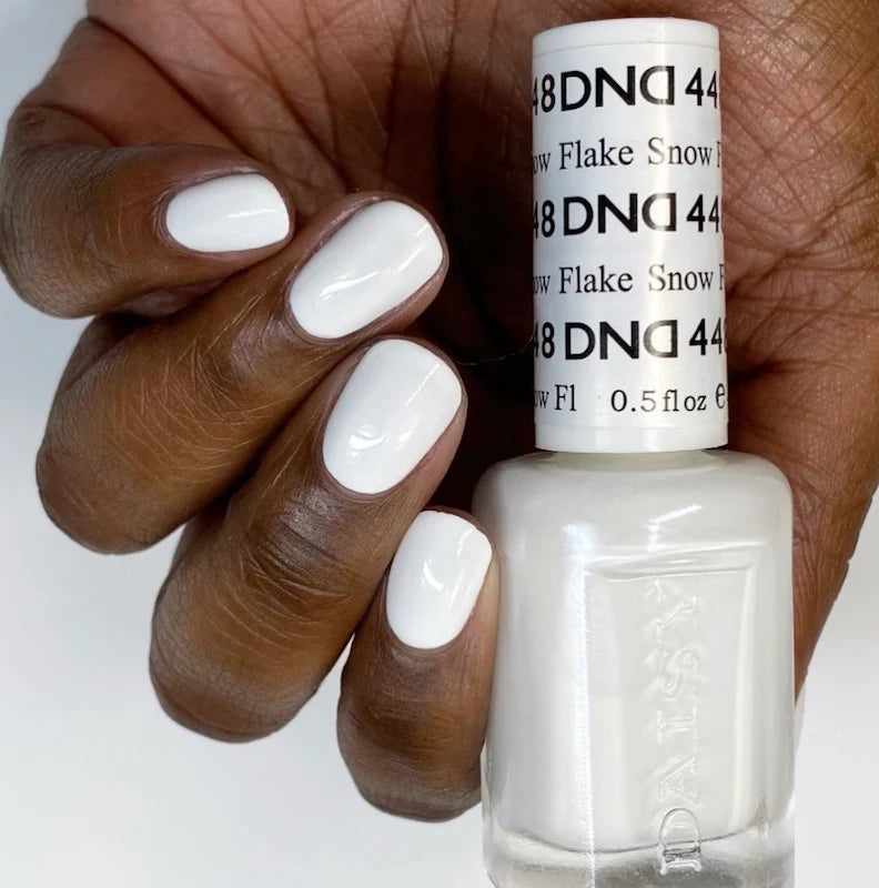 Snow white manicure featuring DND Snow Flake #448 with the matching Gel & Lacquer Duo.
