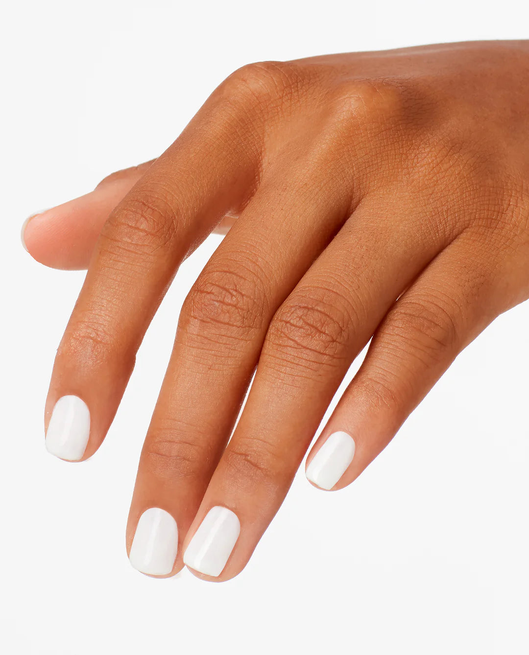 Hand with white funny bunny nail polish on a white background