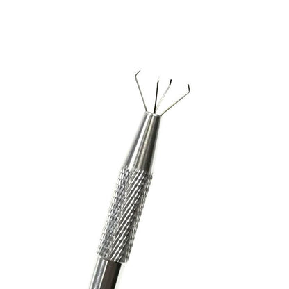 Close up of nail gradient claw tool mechanism holding a sponge
