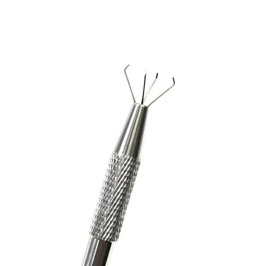 Close up of nail gradient claw tool mechanism holding a sponge

