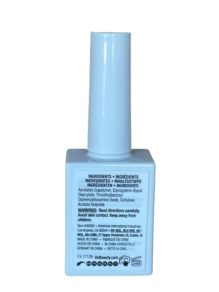 Curing the flexible ibd rubber base coat under a professional LED salon nail lamp