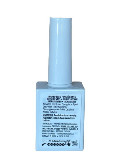 Curing the flexible ibd rubber base coat under a professional LED salon nail lamp