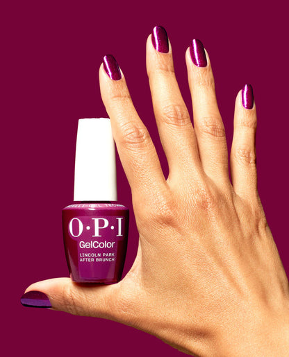 OPI GelColor Lincoln Park After Brunch S071 blackberry shimmer gel polish displayed on a professional nail salon vanity station.
