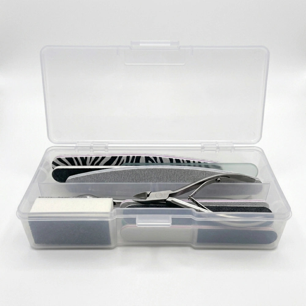 Empty clear nail storage box and transparent manicure tool organizer container.