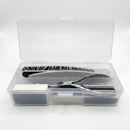 Empty clear nail storage box and transparent manicure tool organizer container.