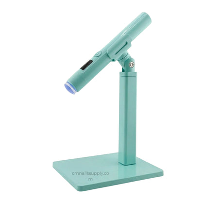 Mini flash cure light for securing nail extensions and intricate art
