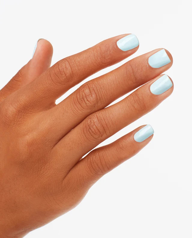 Close up of fingernails painted with OPI GelColor baby blue gel polish showing a soft pastel finish