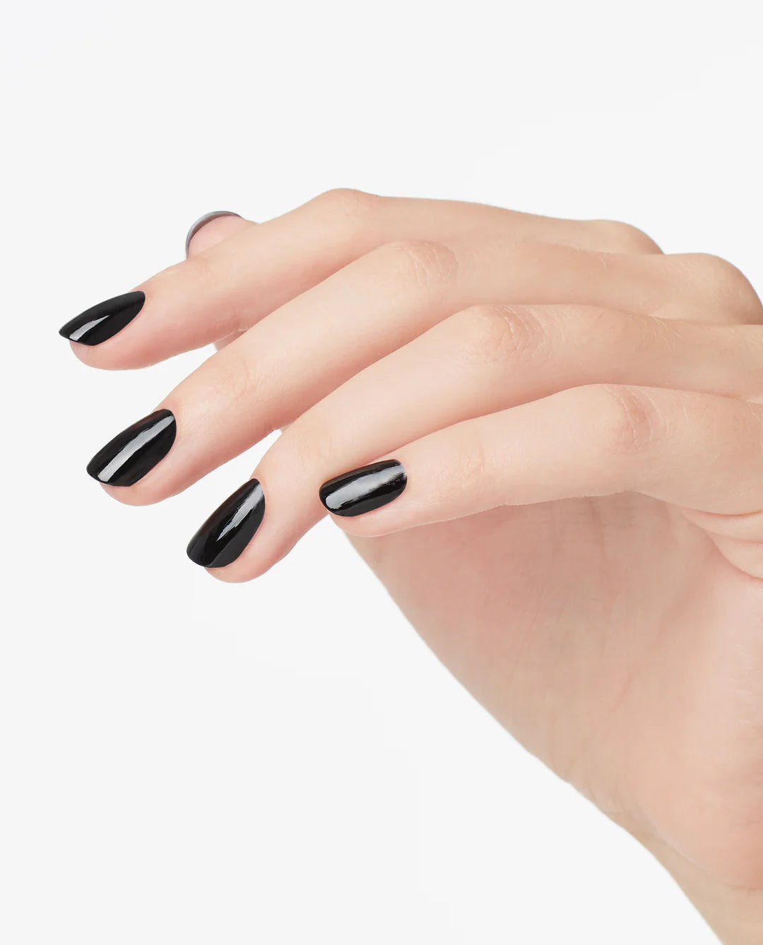 Close up of fingernails painted with OPI GelColor black gel polish showing a bold glossy finish