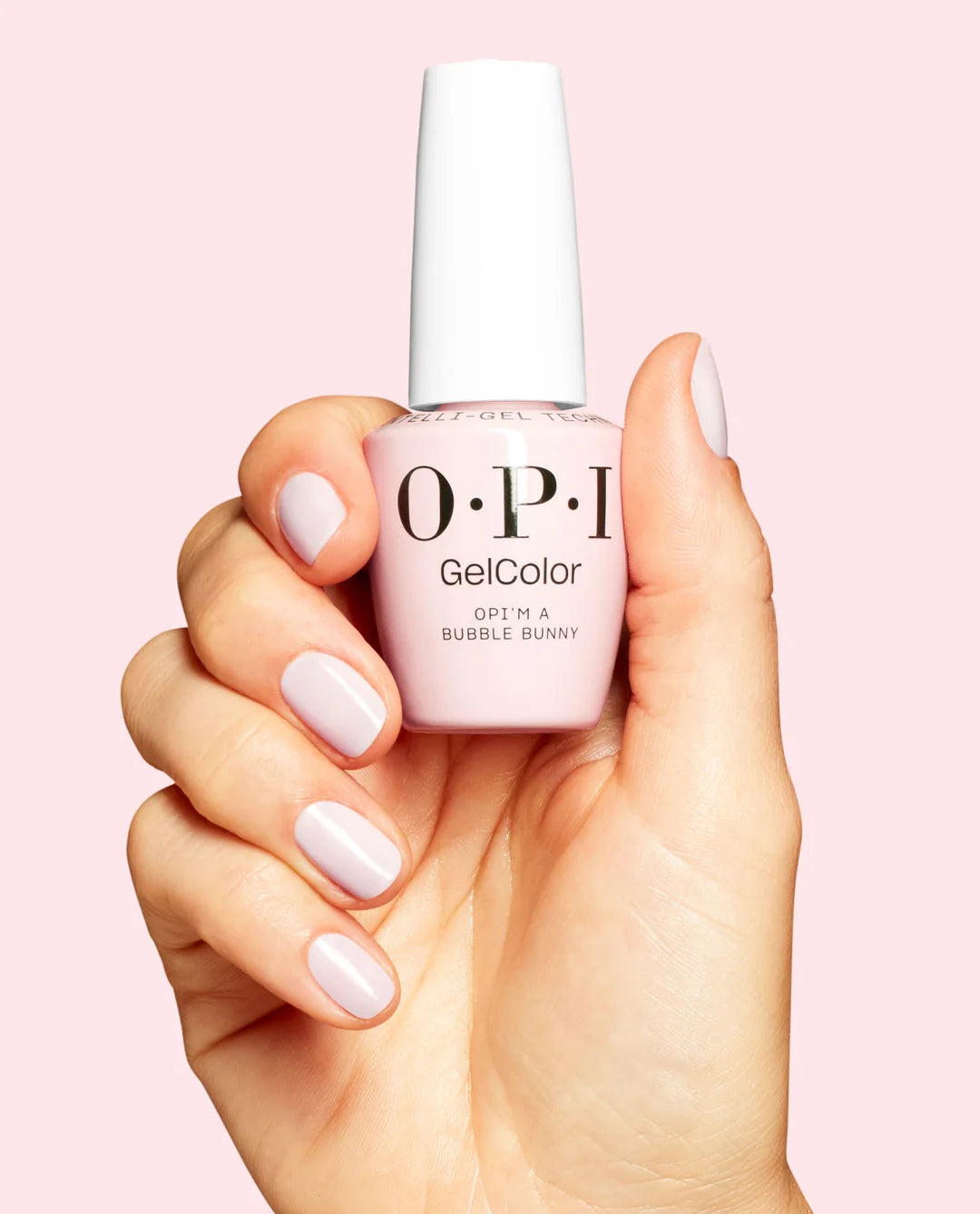 Gel manicure on natural nails displaying OPI GelColor OPI'm a Bubble Bunny milky sheer pink glossy finish.

