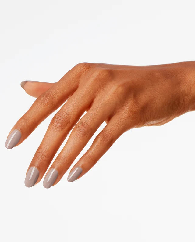 Close up of fingernails painted with OPI GelColor dove beige gel polish showing a clean glossy finish
