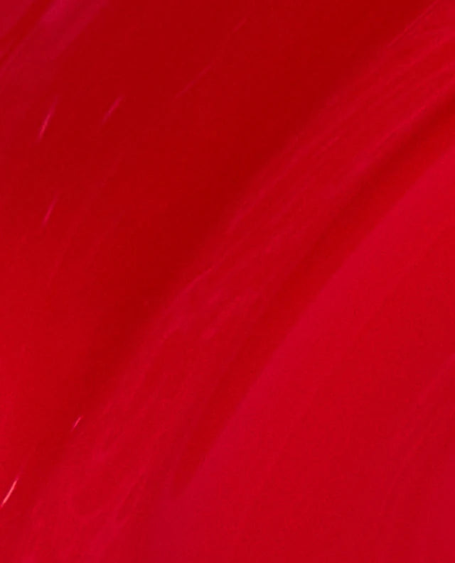 Close up of OPI Big Apple Red N25 bright shiny red gel polish color