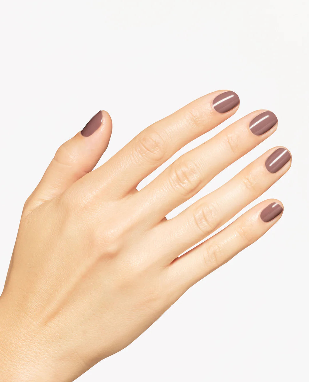 Gel manicure on natural nails displaying OPI GelColor You Don't Know Suzi mocha brown crème glossy finish.
