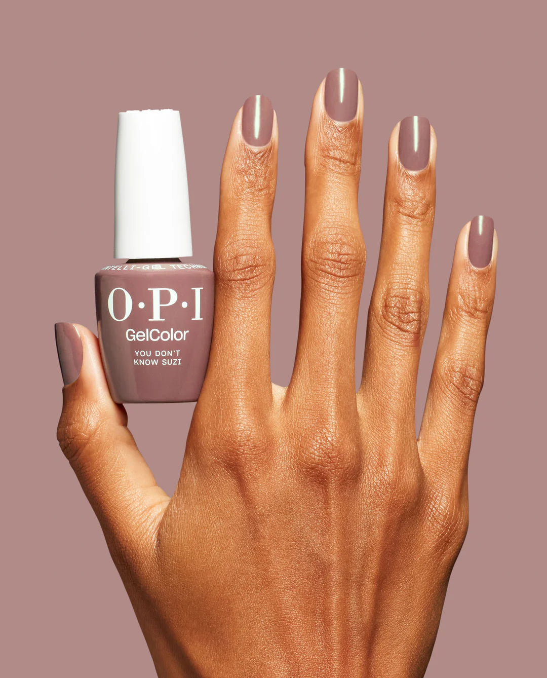 OPI GelColor You Don't Know Suzi S063 mocha gel polish displayed on a professional nail salon vanity station.
