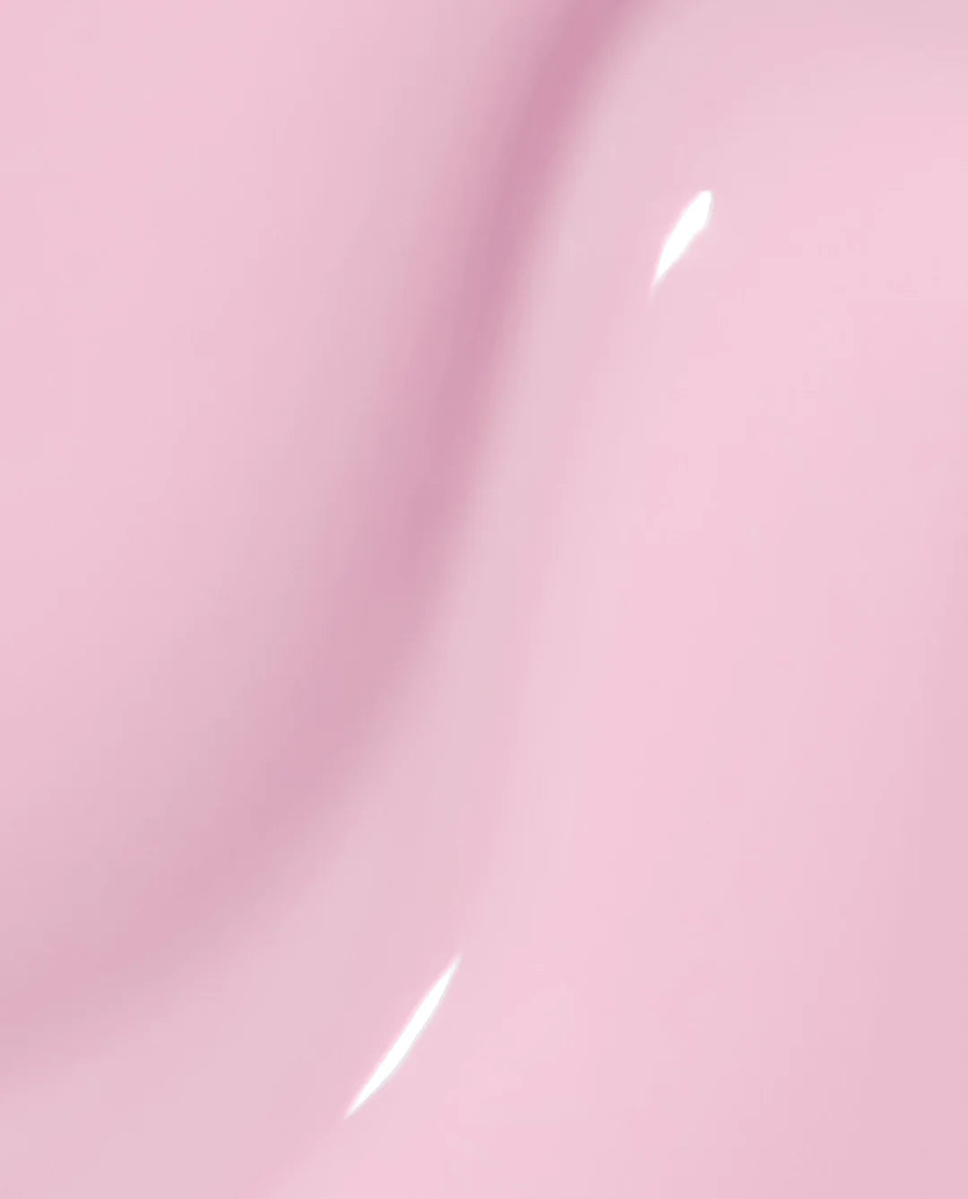 Sheer baby pink swatch of OPI Infinite Shine It's A Girl on a nail wheel