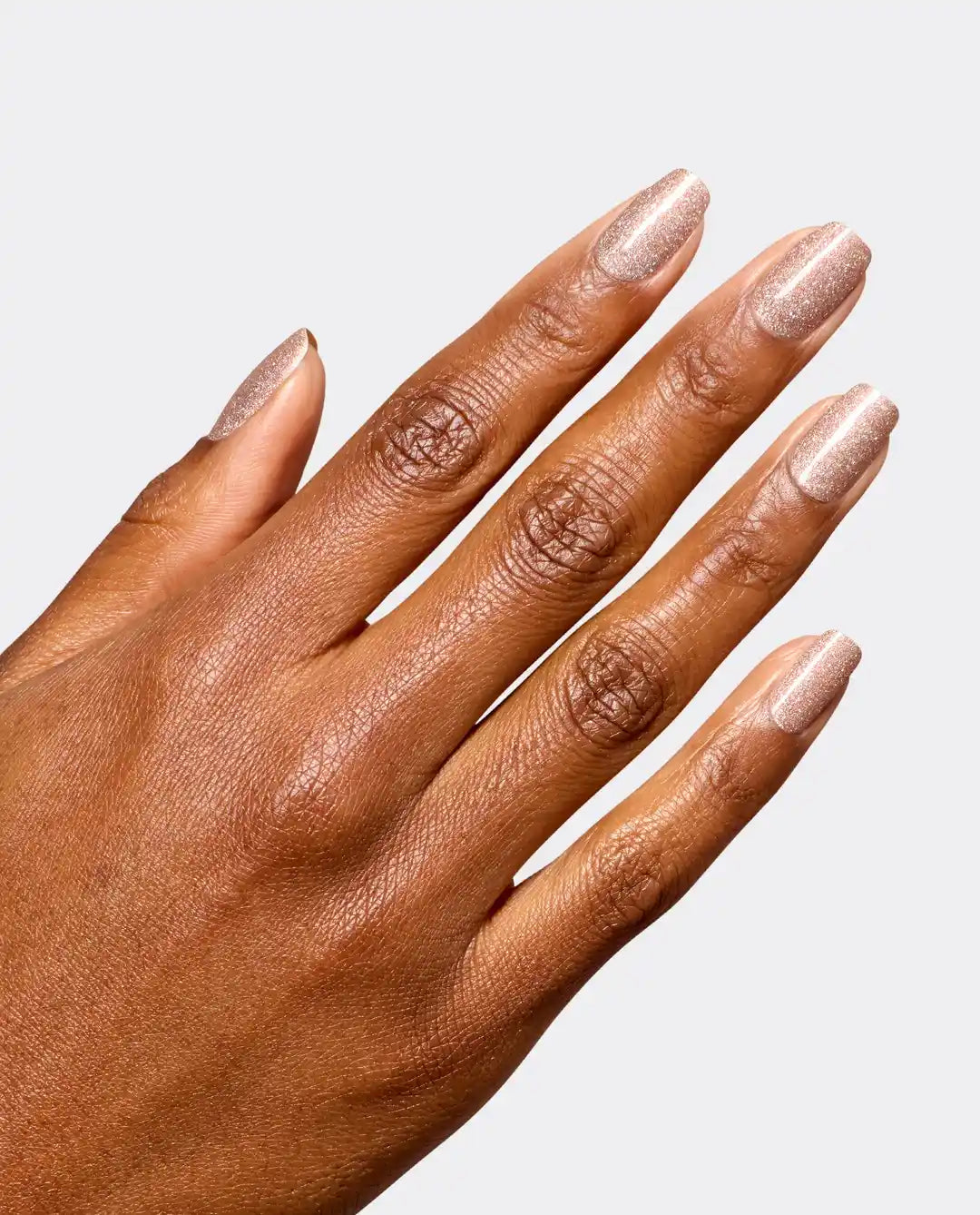 OPI Infinite Shine L223 taupe glitter nail polish on manicure hand