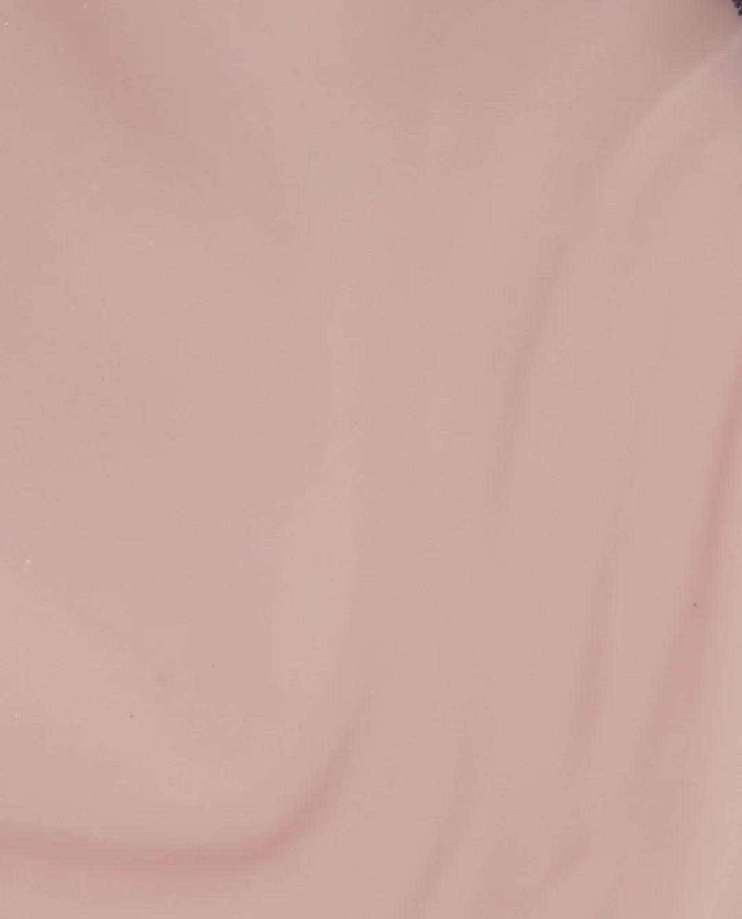 Close up detail of OPI GelColor SH4 showing delicate shimmer particles in nude gel.