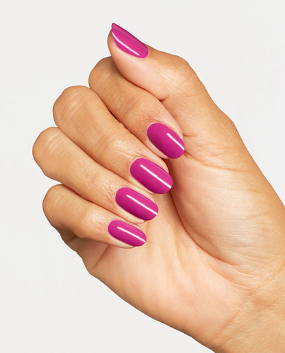 OPI Strawberry Cosmo S070 fuchsia crème manicure with vibrant pink nails