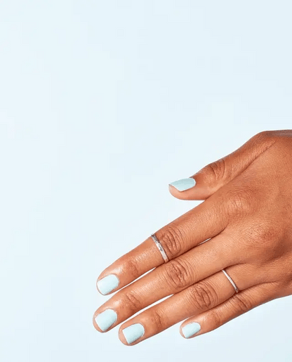 Manicured nails painted with OPI T75 baby blue gel polish showing the soft pastel color