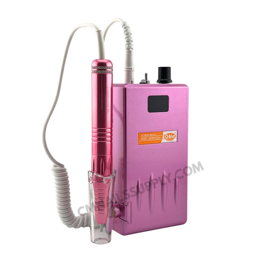 rose gold nail drill kit with pink accessories including drill bits and charging base