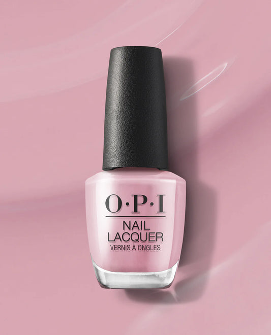 OPI Pink on Canvas nail polish bottle with black cap on a pink background