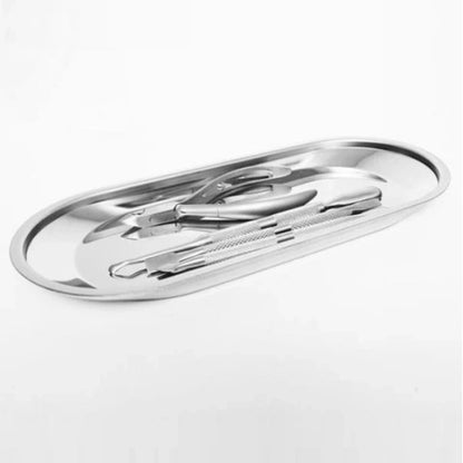 Professional oval dish for holding and sanitizing nail tools in a salon environment.
