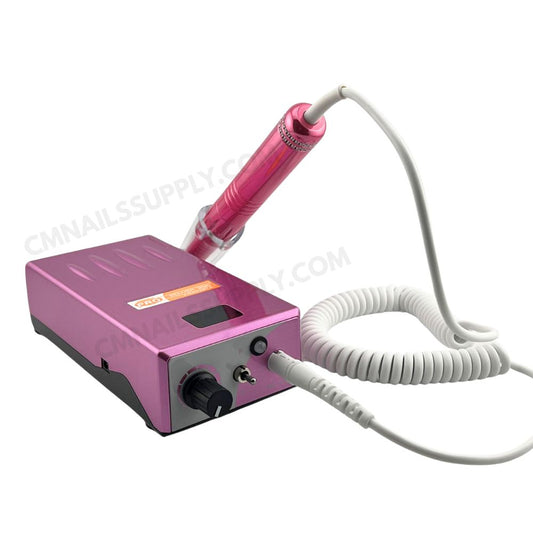 Professional nail technician using rose gold MediCool 35K electric nail drill on acrylic nails