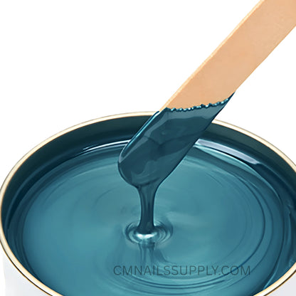 Melted Sharonelle azulene hard wax texture in pot
