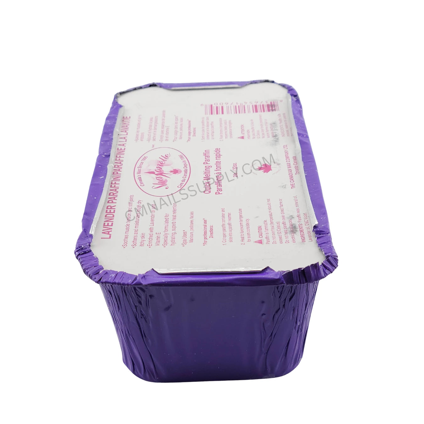 Melted Sharonelle lavender paraffin wax texture in pot

