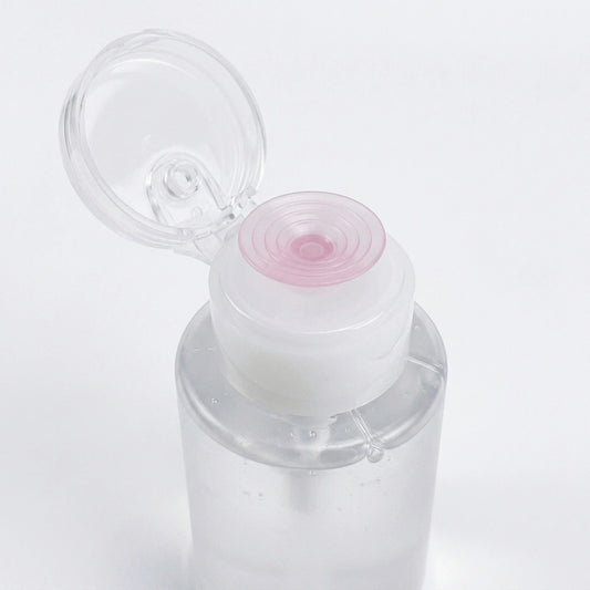 An angled view showcasing the spill-proof and leak-resistant features of the liquid dispenser bottle