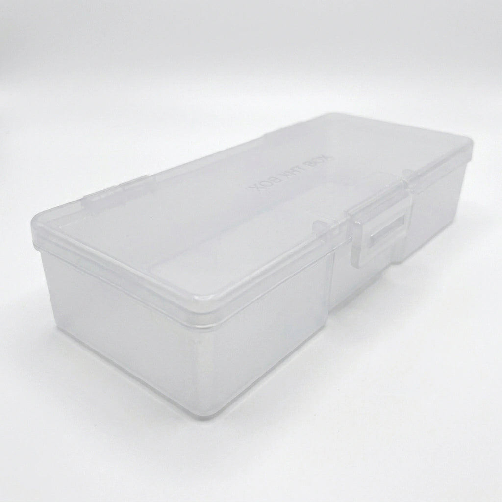 An open transparent plastic manicure tool box displaying its spacious interior.