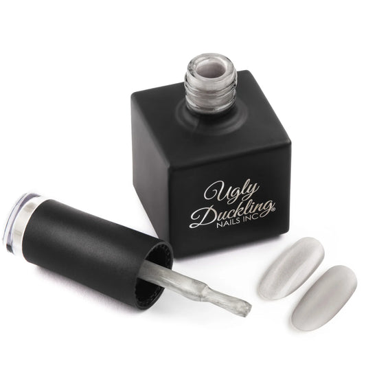 ugly duckling gel polish silver lining 329 in a black bottle, TPO and HEMO free formula. Nail Swatch shown next to brush.